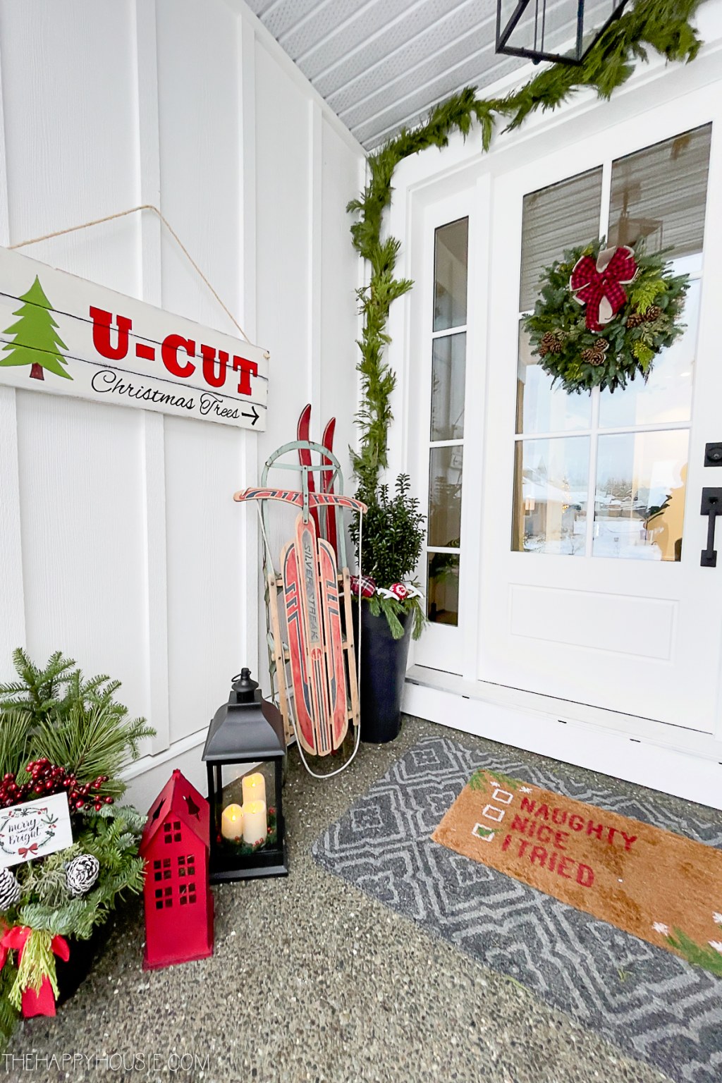 Picture of: Modern Farmhouse Christmas Front Porch Decor  The Happy Housie